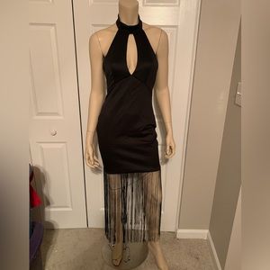 Black halter fringe dress.